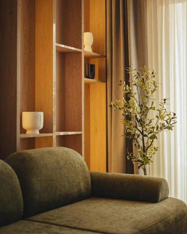 Wood shelving detail with sculptural planter